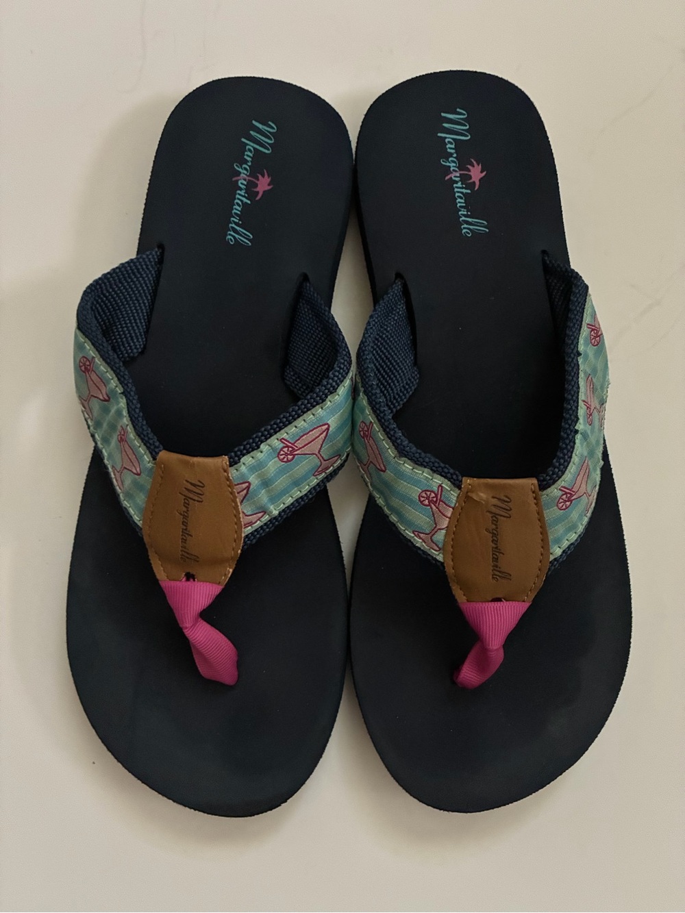 Margaritaville size 9 blue and Pink Flip Flops with Martini glass Pattern